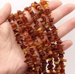 collier ambre bebe brun
