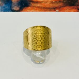 Ornement en pierre de lune avec symbole géométrique sacré, bijou spirituel, protection et harmonie.