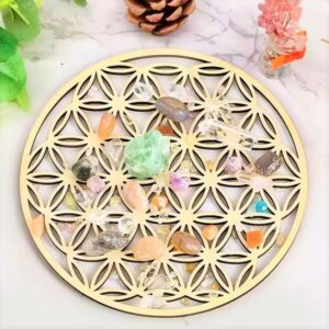 Fleur de vie en bois chargement des pierres