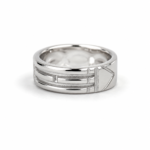 Close-up of a polished silver ring with a modern triple-band design and geometric cutouts on a white background.
